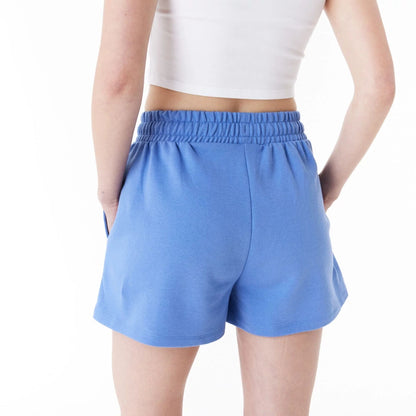 The Female model is wearing New Era Blue Womens Sweat Shorts 5