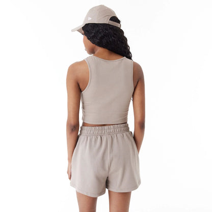 The Female model is wearing New Era Womens Brown Crop Tank Top 5