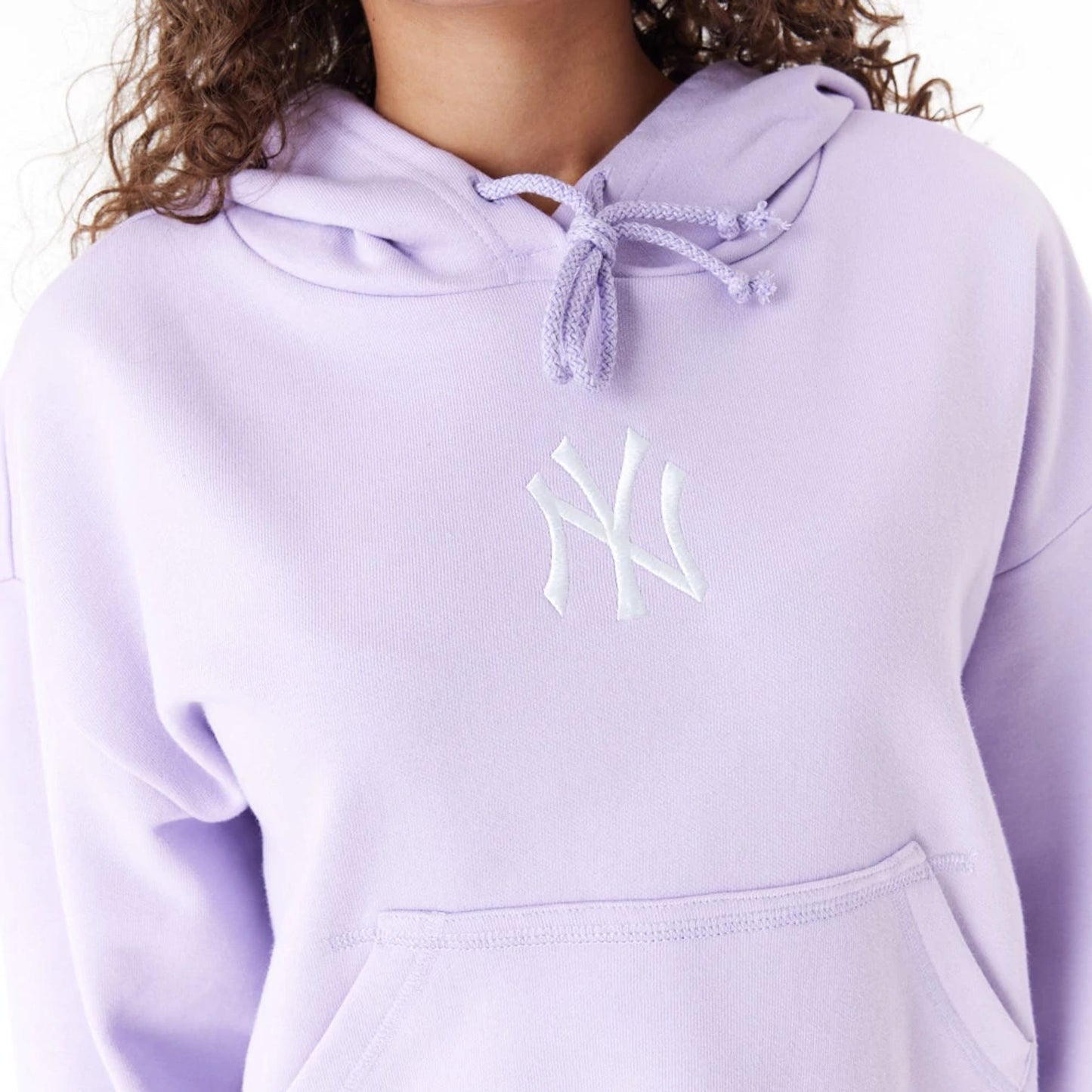 The Female model is wearing New York Yankees MLB Lifestyle Purple Womens Crop Pullover Hoodie 4