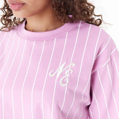 The Female model is wearing New Era Pinstripe Pink Womens Crop T-Shirt 5