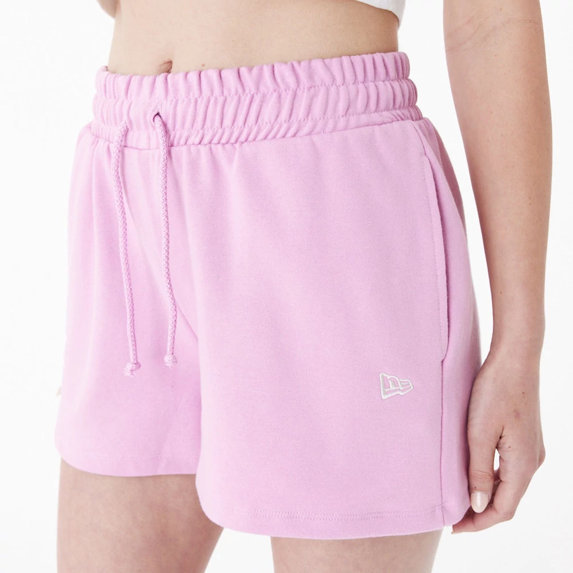 The Female model is wearing New Era Pink Womens Sweat Shorts 8