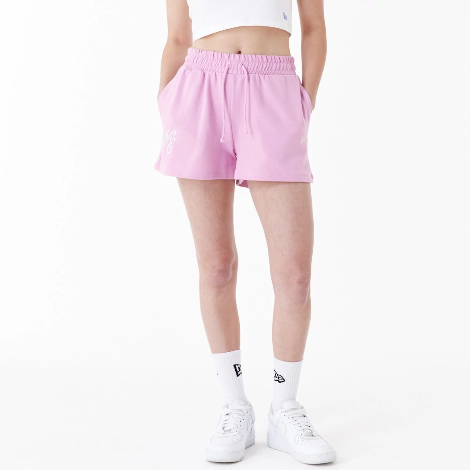 The Female model is wearing New Era Pink Womens Sweat Shorts 1