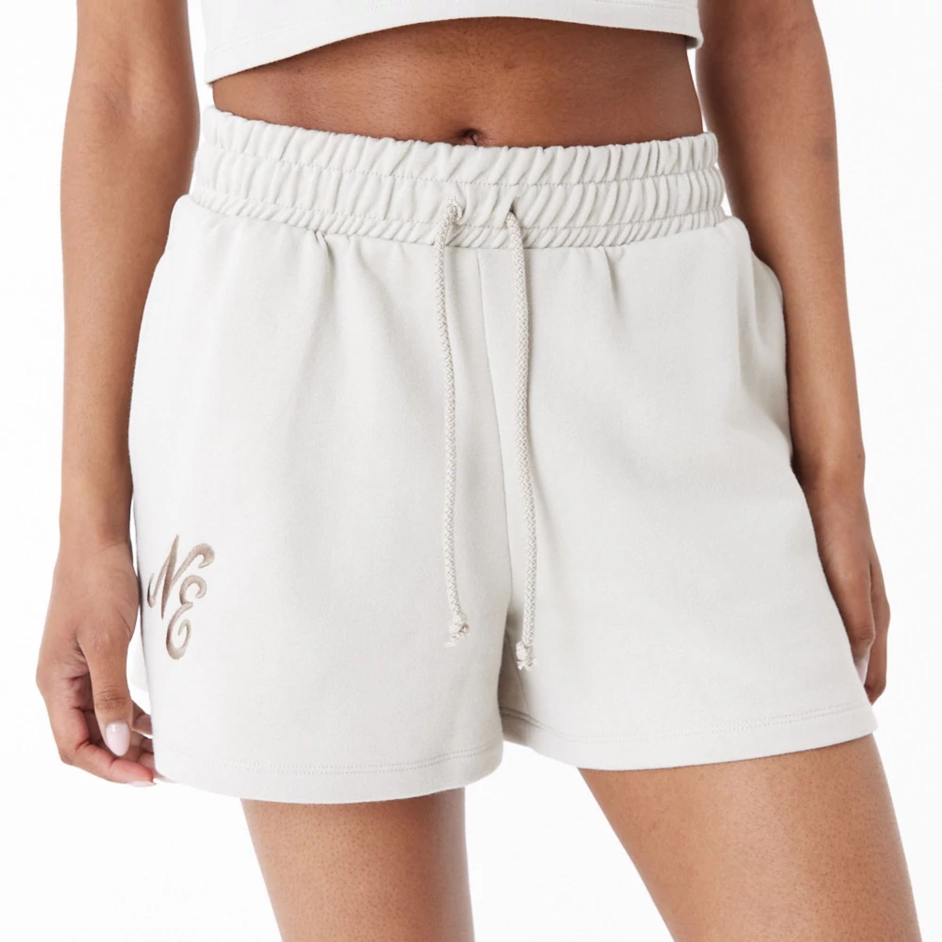 The Female model is wearing New Era Stone Womens Sweat Shorts 8