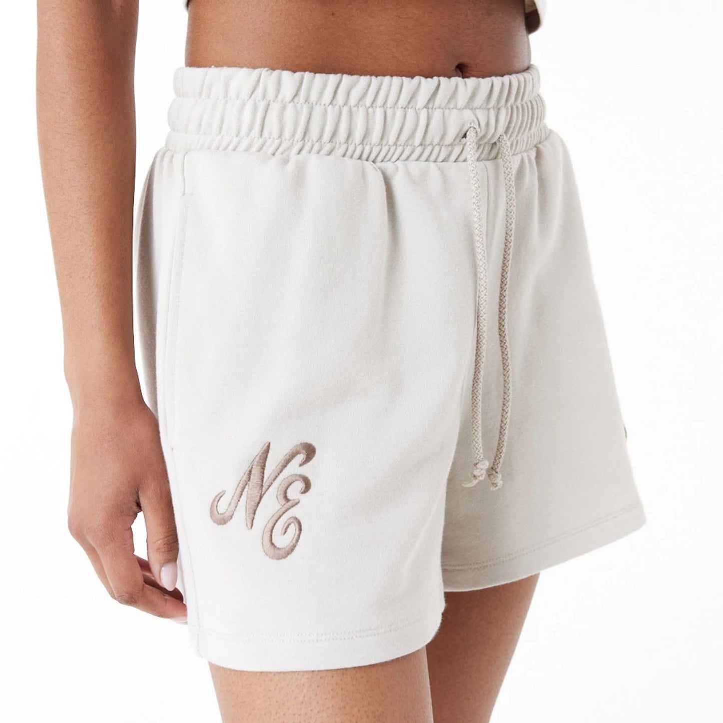 The Female model is wearing New Era Stone Womens Sweat Shorts 1