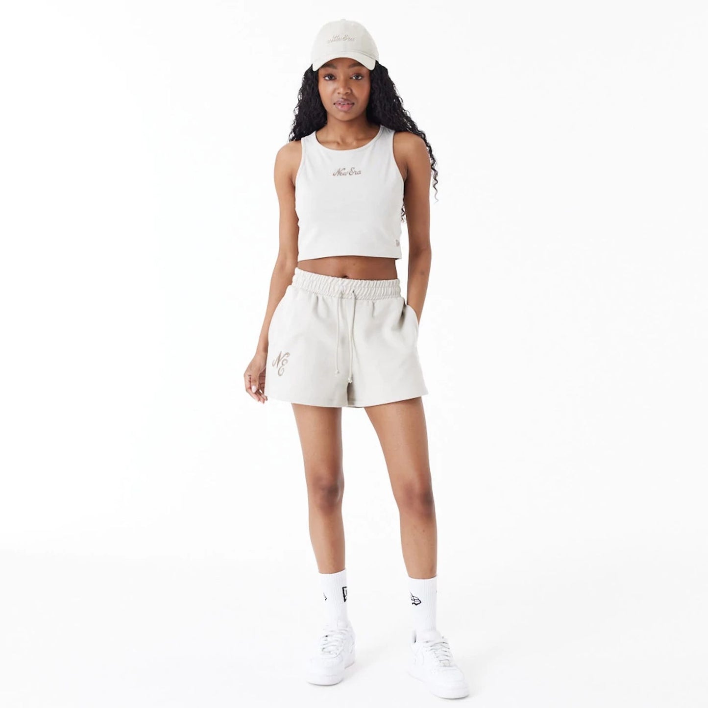 The Female model is wearing New Era Stone Womens Sweat Shorts 2