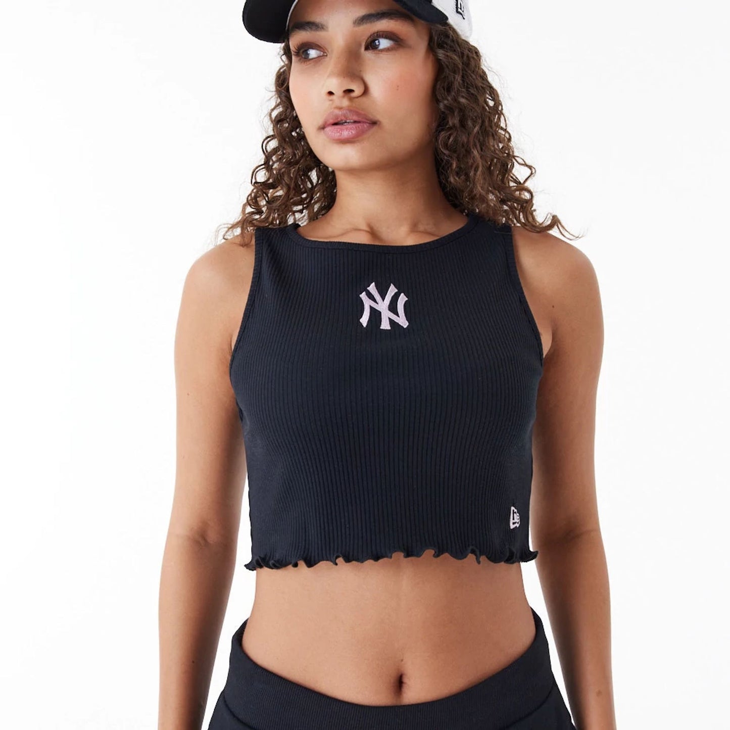 The Female model is wearing New York Yankees MLB Lifestyle Black Womens Crop Tank Top 9