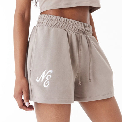 The Female model is wearing New Era Brown Womens Sweat Shorts 1