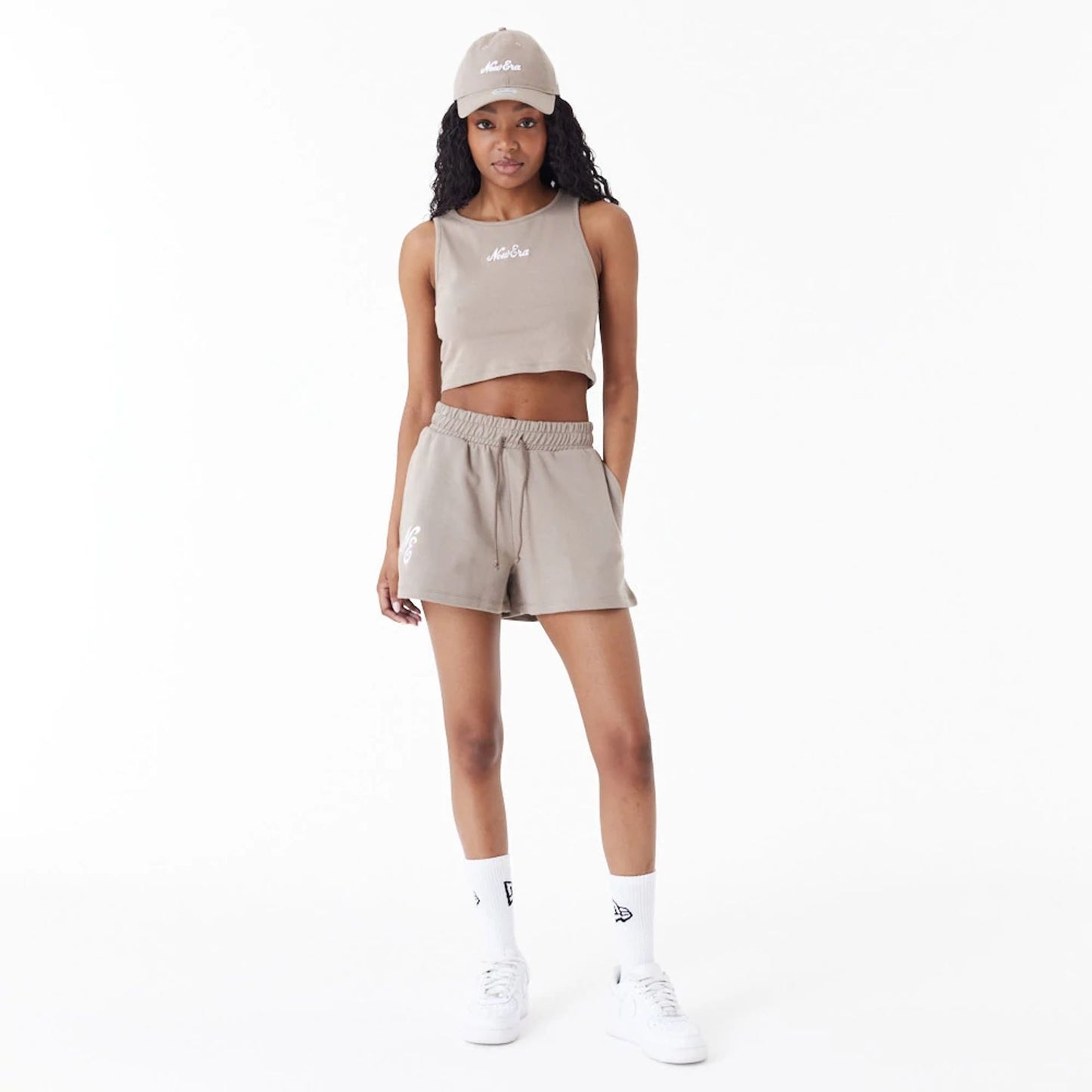 The Female model is wearing New Era Brown Womens Sweat Shorts 5