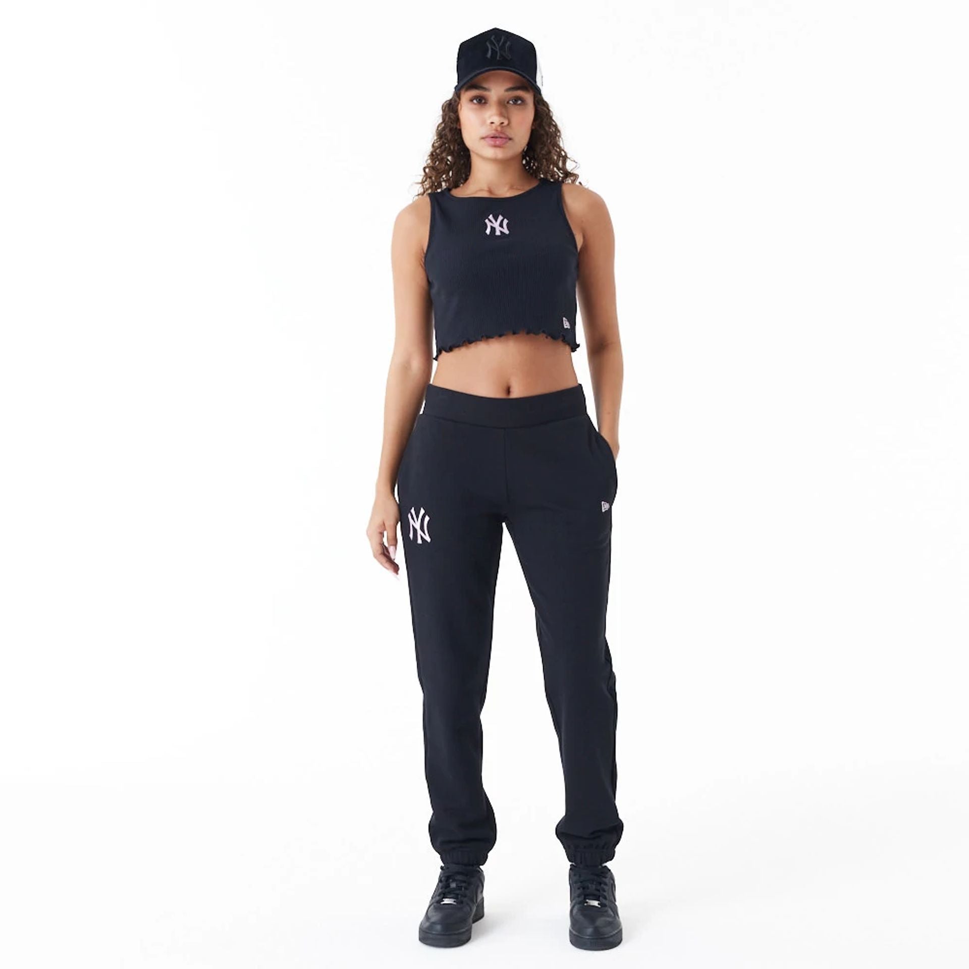 The Female model is wearing New York Yankees Womens MLB Lifestyle Black Joggers 6