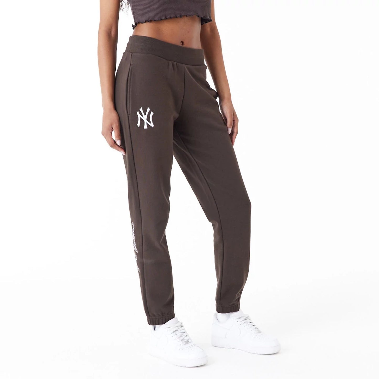 The Female model is wearing New York Yankees MLB Lifestyle Brown Joggers 1