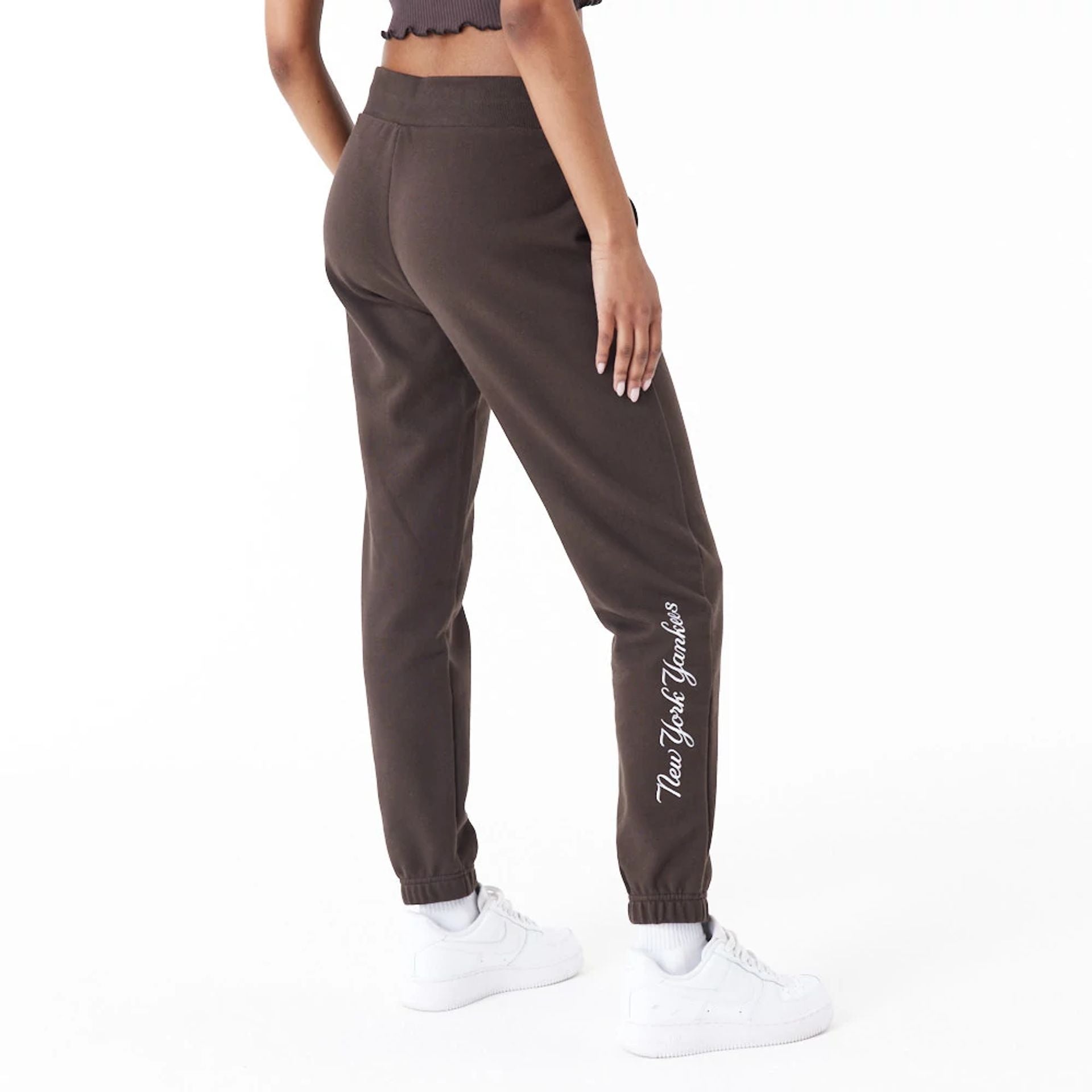 The Female model is wearing New York Yankees MLB Lifestyle Brown Joggers 5