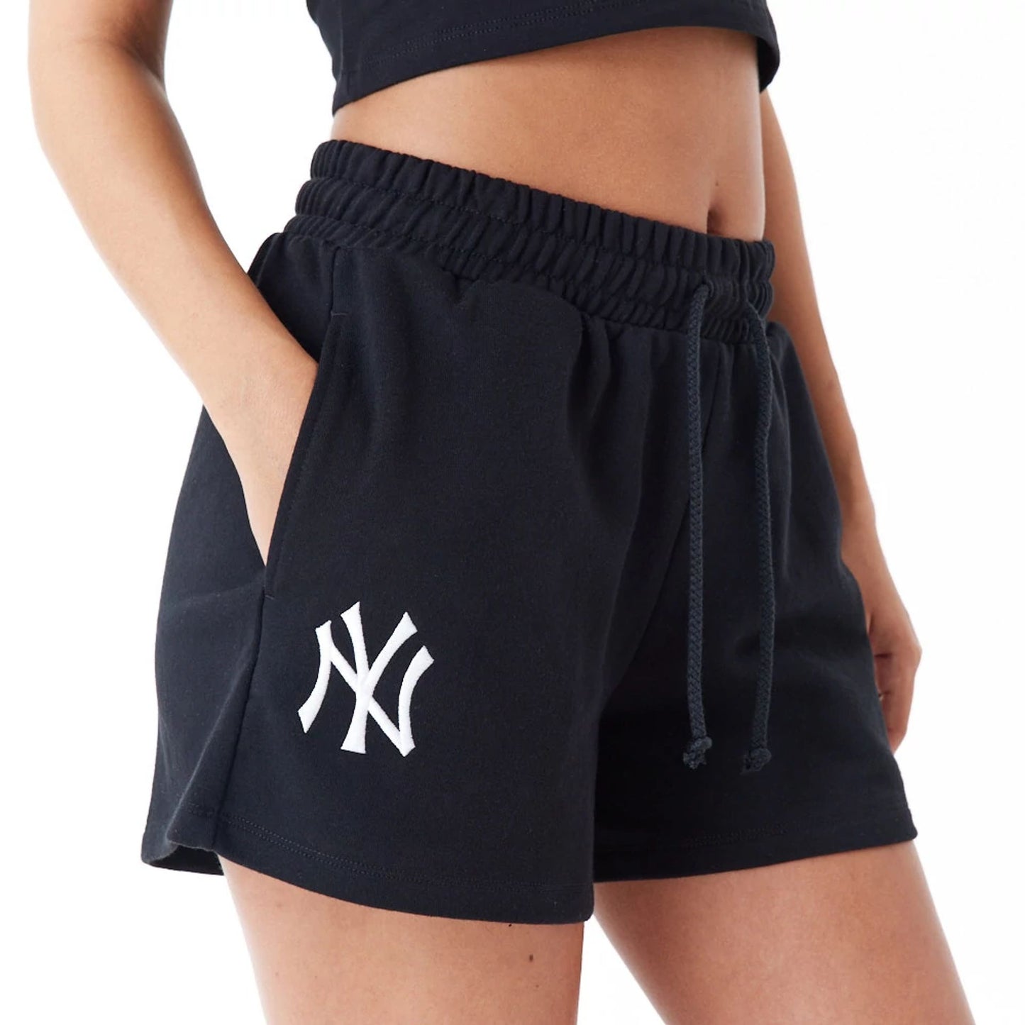 The Female model is wearing New York Yankees Womens MLB Lifestyle Black Shorts 1