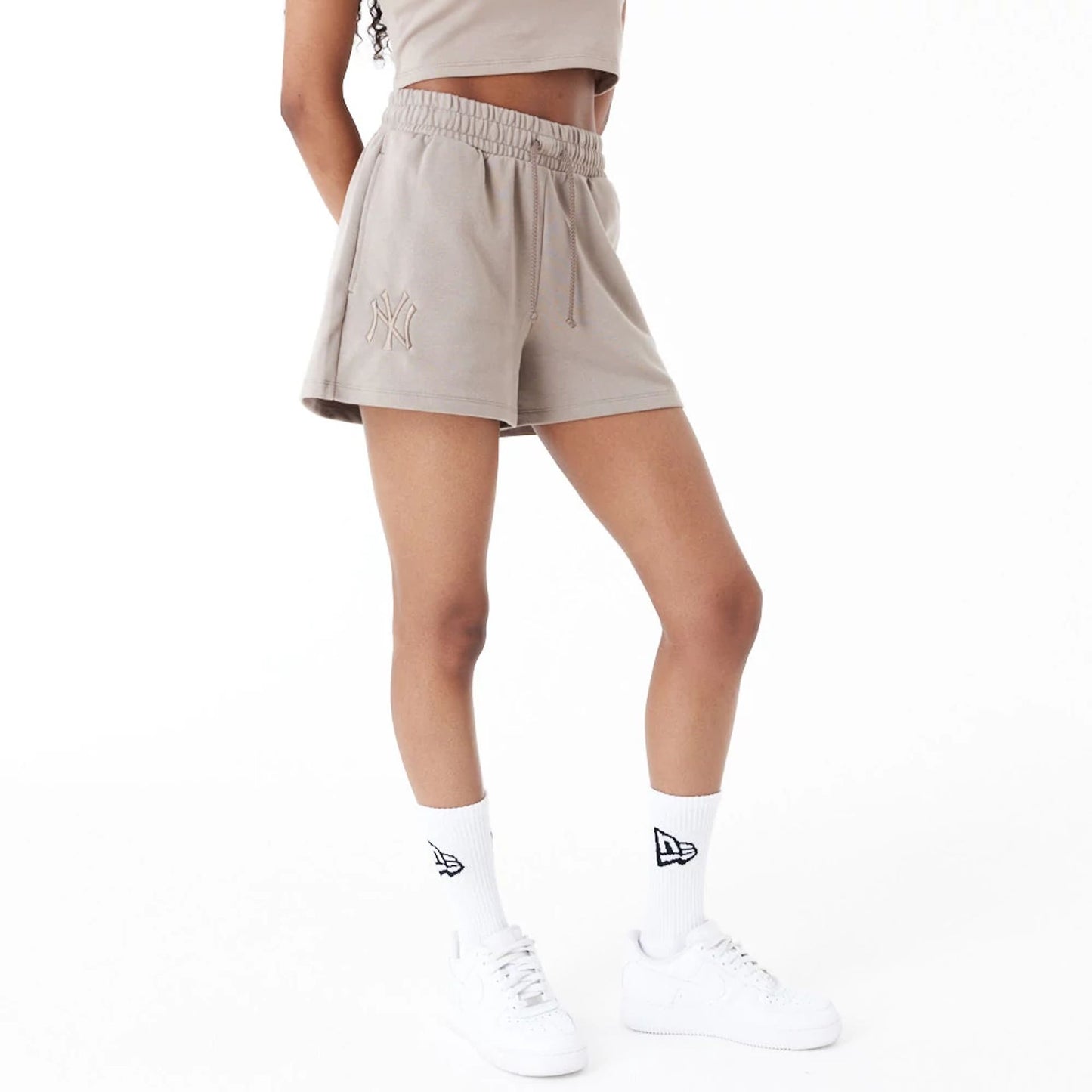 The Female model is wearing New York Yankees Womens MLB Lifestyle Brown Shorts 1