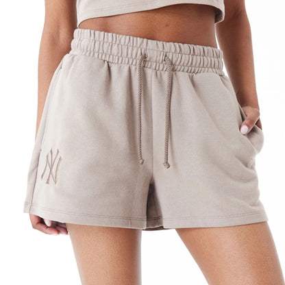 The Female model is wearing New York Yankees Womens MLB Lifestyle Brown Shorts 4