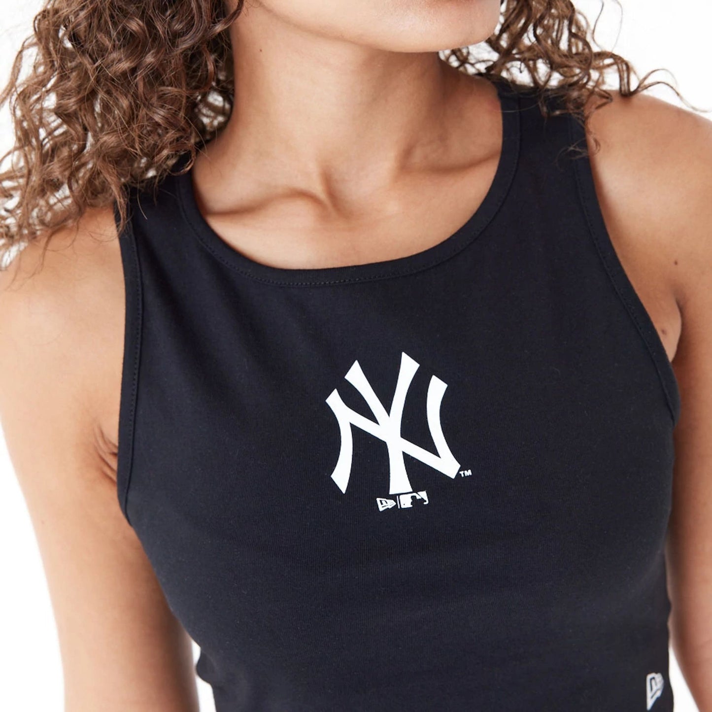 The Female model is wearing New York Yankees Womens MLB Lifestyle Black Crop Tank Top 9