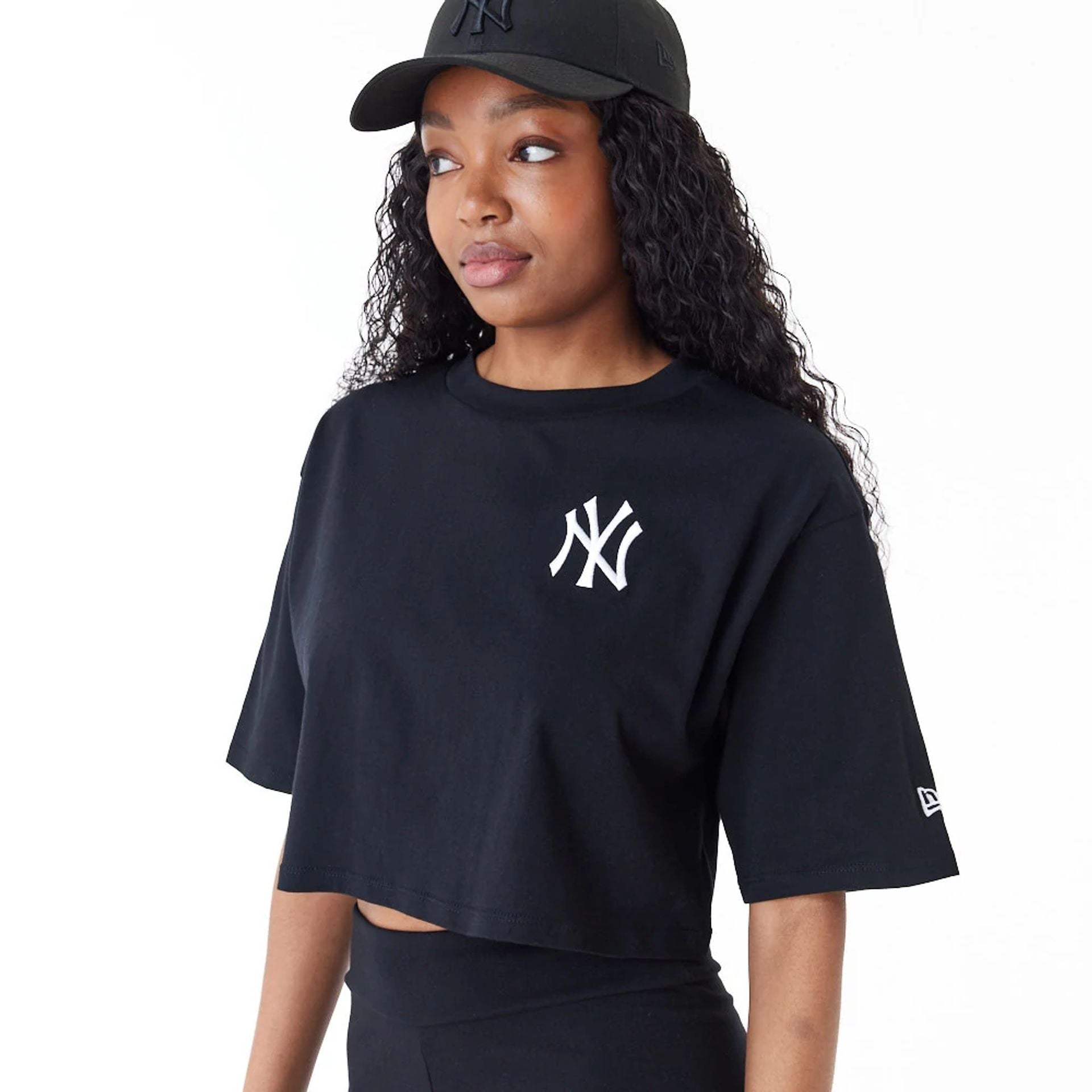 The Female model is wearing New York Yankees Womens MLB Lifestyle Black Crop T-Shirt 5