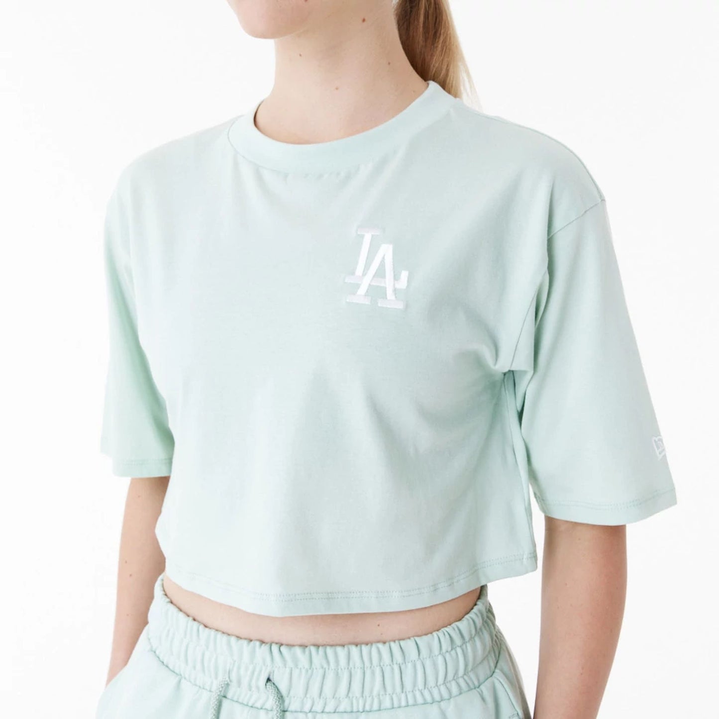 The Female model is wearing LA Dodgers Womens MLB Lifestyle Green Crop T-Shirt 5