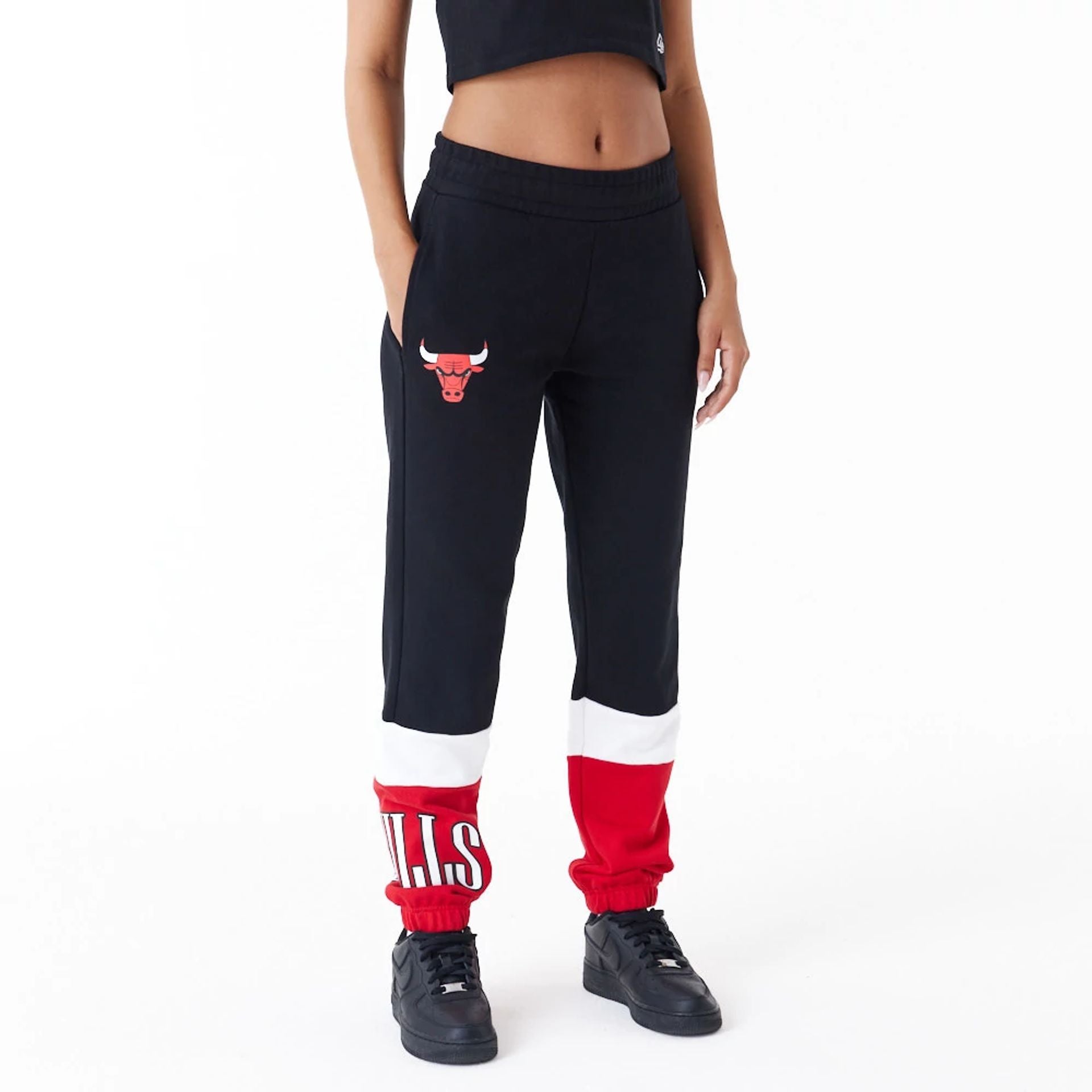 The Female model is wearing Chicago Bulls NBA Colour Block Black Joggers 5