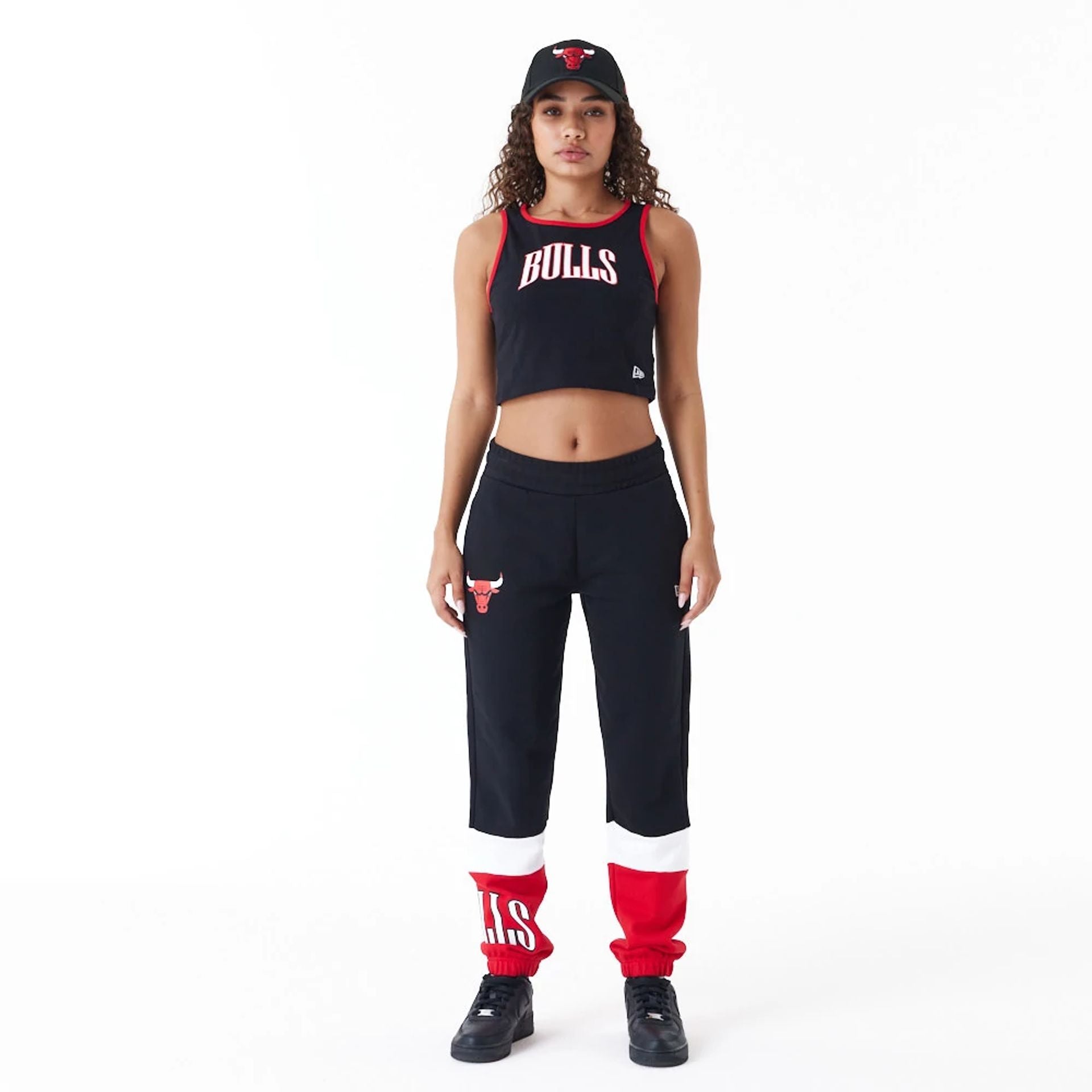 The Female model is wearing Chicago Bulls NBA Colour Block Black Joggers 1