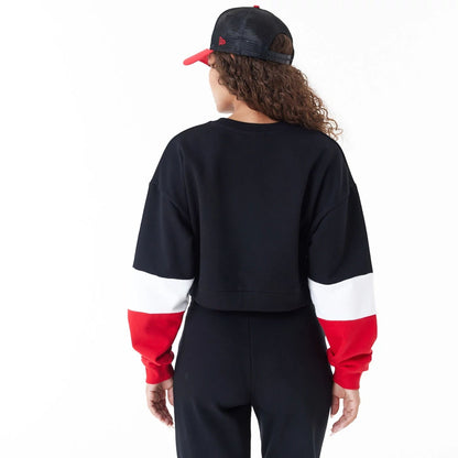 The Female model is wearing Chicago Bulls Womens NBA Colour Block Black Crop Crew Neck Sweatshirt 3