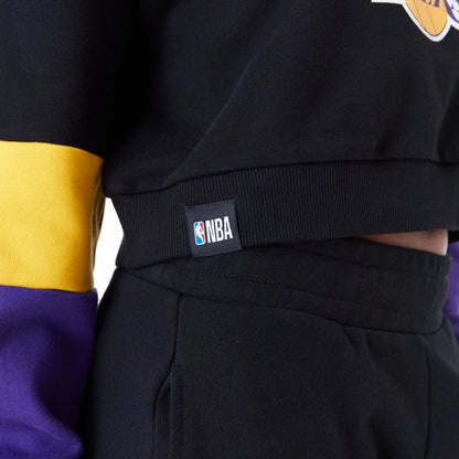 The Female model is wearing LA Lakers Womens NBA Colour Block Black Crop Crew Neck Sweatshirt 6