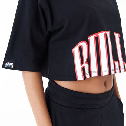 The Female model is wearing Chicago Bulls Womens NBA Team Wordmark Black Crop T-Shirt 9