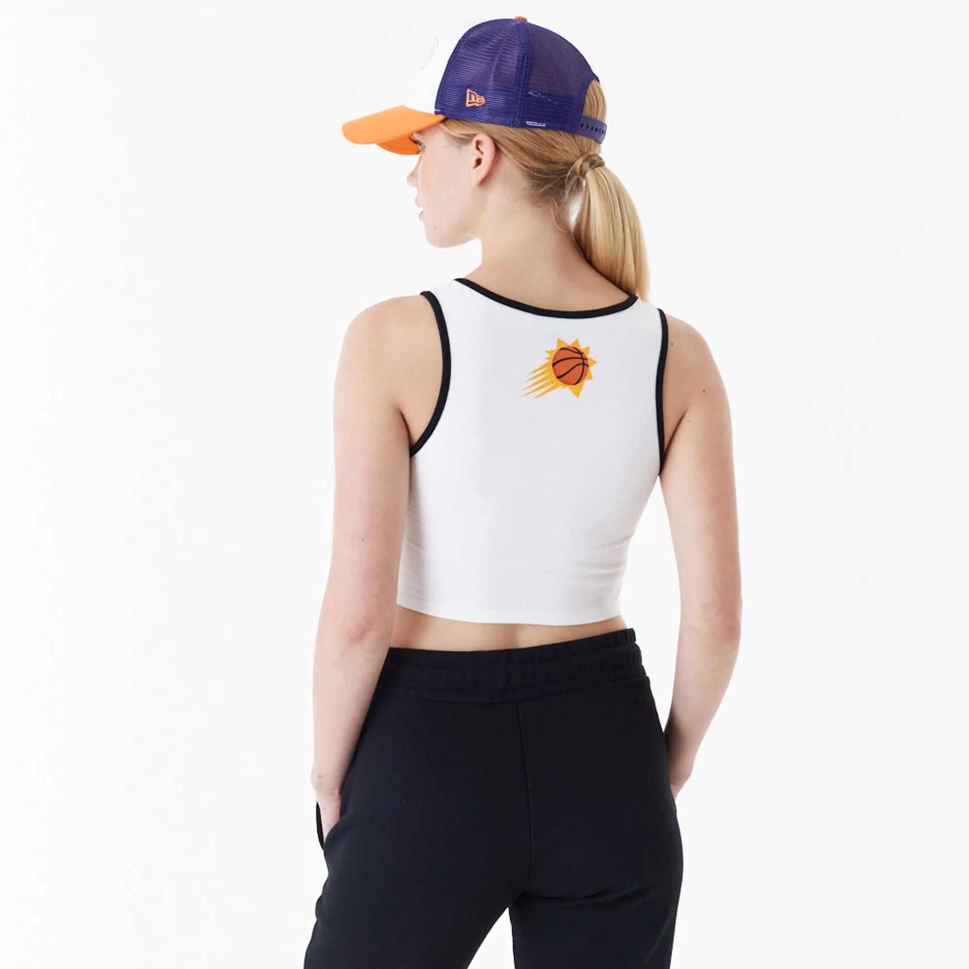 The Female model is wearing Phoenix Suns Womens NBA Team Wordmark White Crop Tank Top 3