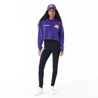 The Female model is wearing LA Lakers Womens NBA Team Logo Purple Crop Pullover Hoodie 8