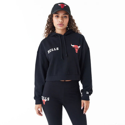 The Female model is wearing Chicago Bulls Womens NBA Team Logo Black Crop Pullover Hoodie 1