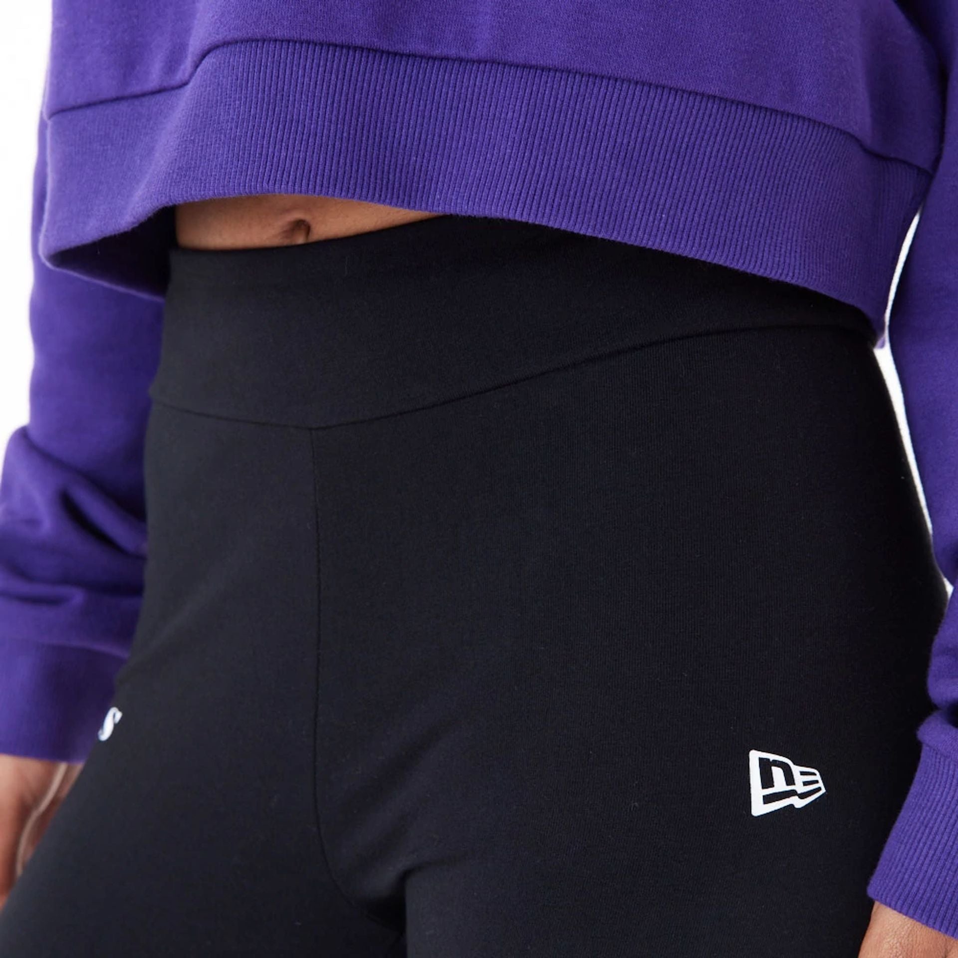 The Female model is wearing LA Lakers Womens NBA Team Logo Black Leggings 5