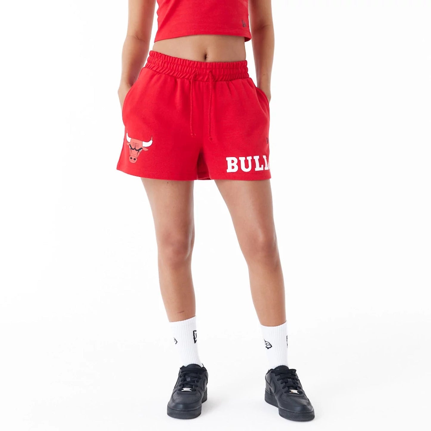 The Female model is wearing Chicago Bulls Womens NBA Team Logo Red Shorts 1