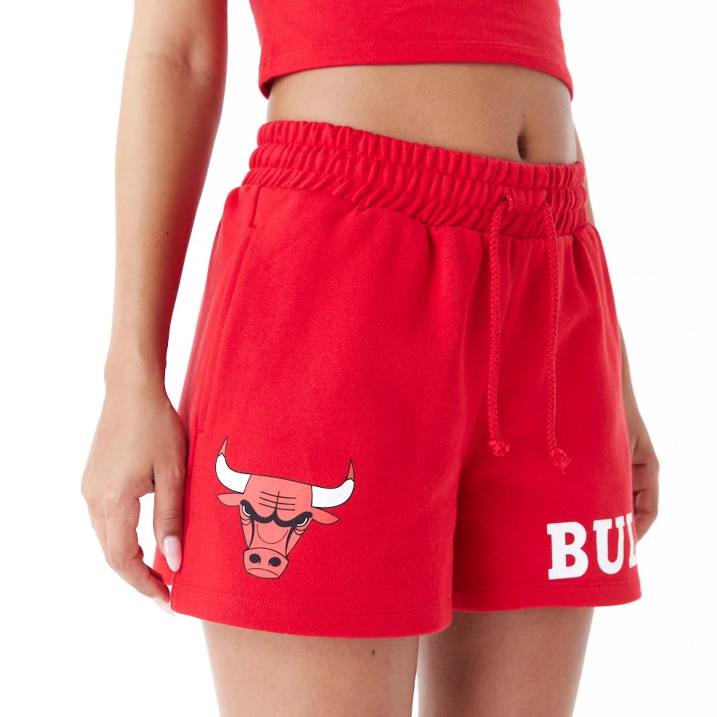 The Female model is wearing Chicago Bulls Womens NBA Team Logo Red Shorts 7