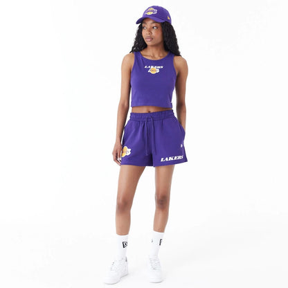 The Female model is wearing LA Lakers Womens NBA Team Logo Purple Shorts 8