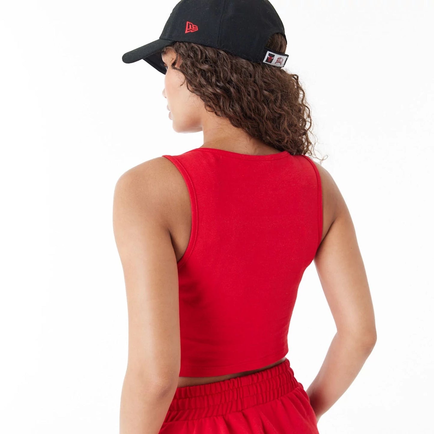 The Female model is wearing Chicago Bulls Womens NBA Team Logo Red Crop Tank Top 7