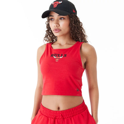 The Female model is wearing Chicago Bulls Womens NBA Team Logo Red Crop Tank Top 4