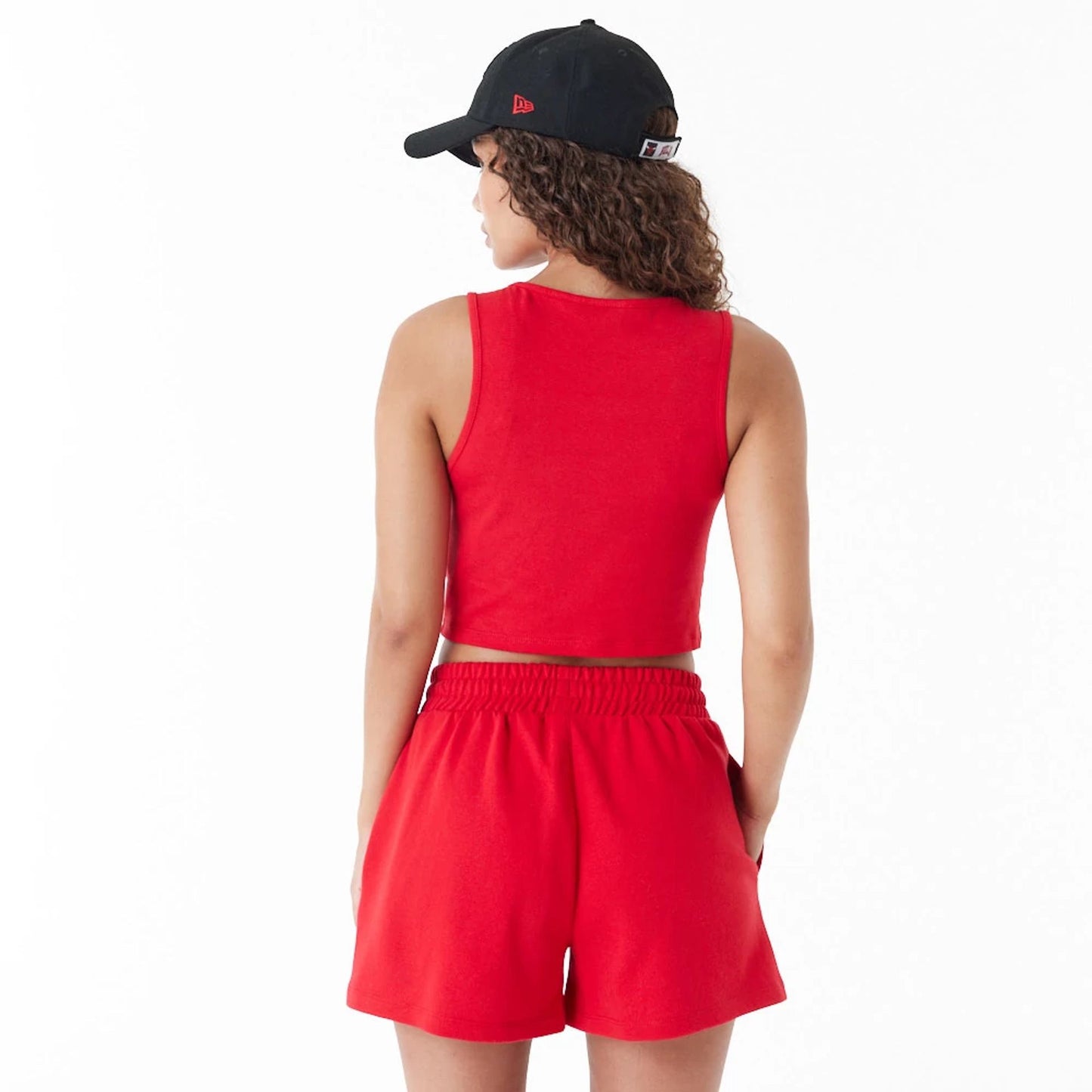 The Female model is wearing Chicago Bulls Womens NBA Team Logo Red Crop Tank Top 3