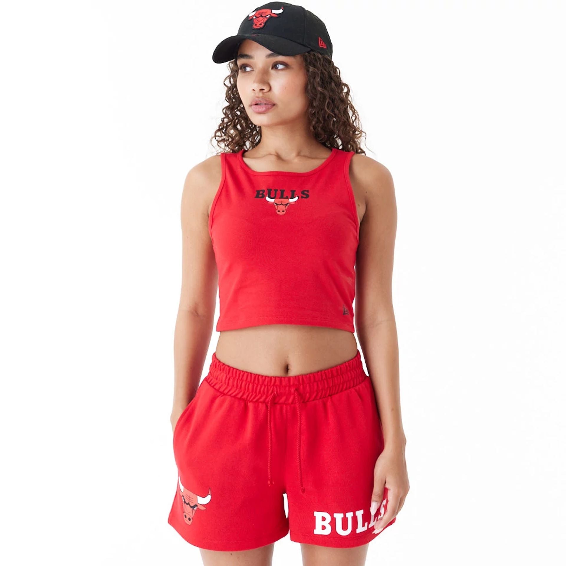 The Female model is wearing Chicago Bulls Womens NBA Team Logo Red Crop Tank Top 1