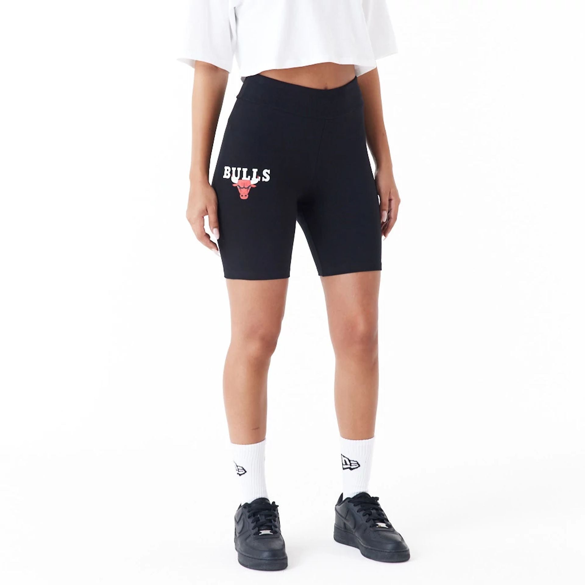 The Female model is wearing Chicago Bulls Womens NBA Logo Black Cycling Shorts 1