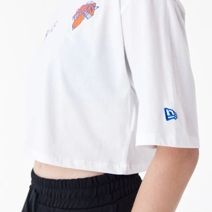 The Female model is wearing New York Knicks Womens NBA Team Logo White Crop T-Shirt 4