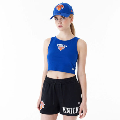 The Female model is wearing New York Knicks Womens NBA Team Logo Blue Crop Tank Top 1