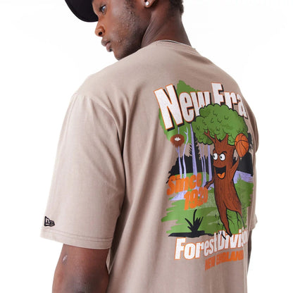 The Male model is wearing New Era Character Graphic Brown Oversized T-Shirt 4