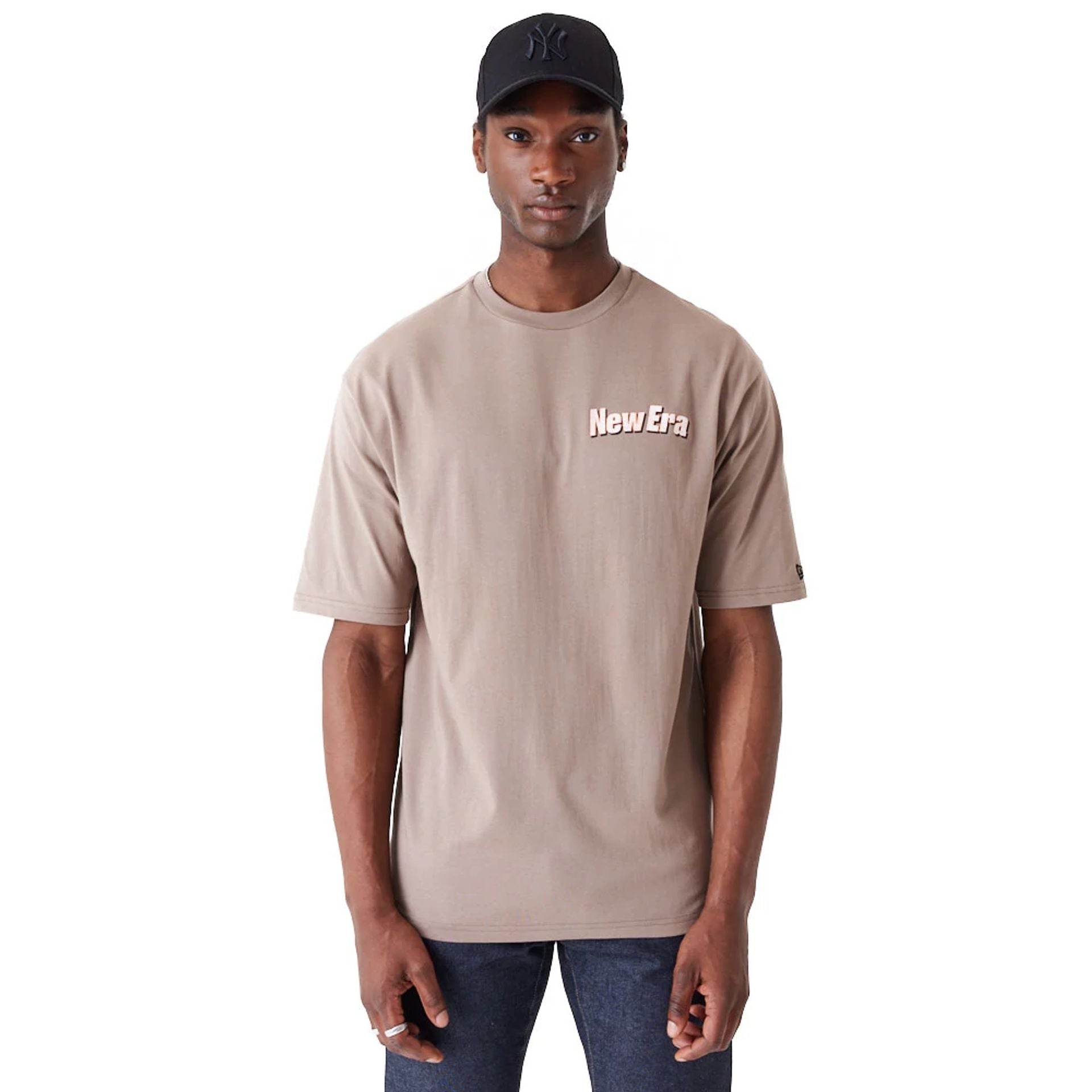 The Male model is wearing New Era Character Graphic Brown Oversized T-Shirt 1