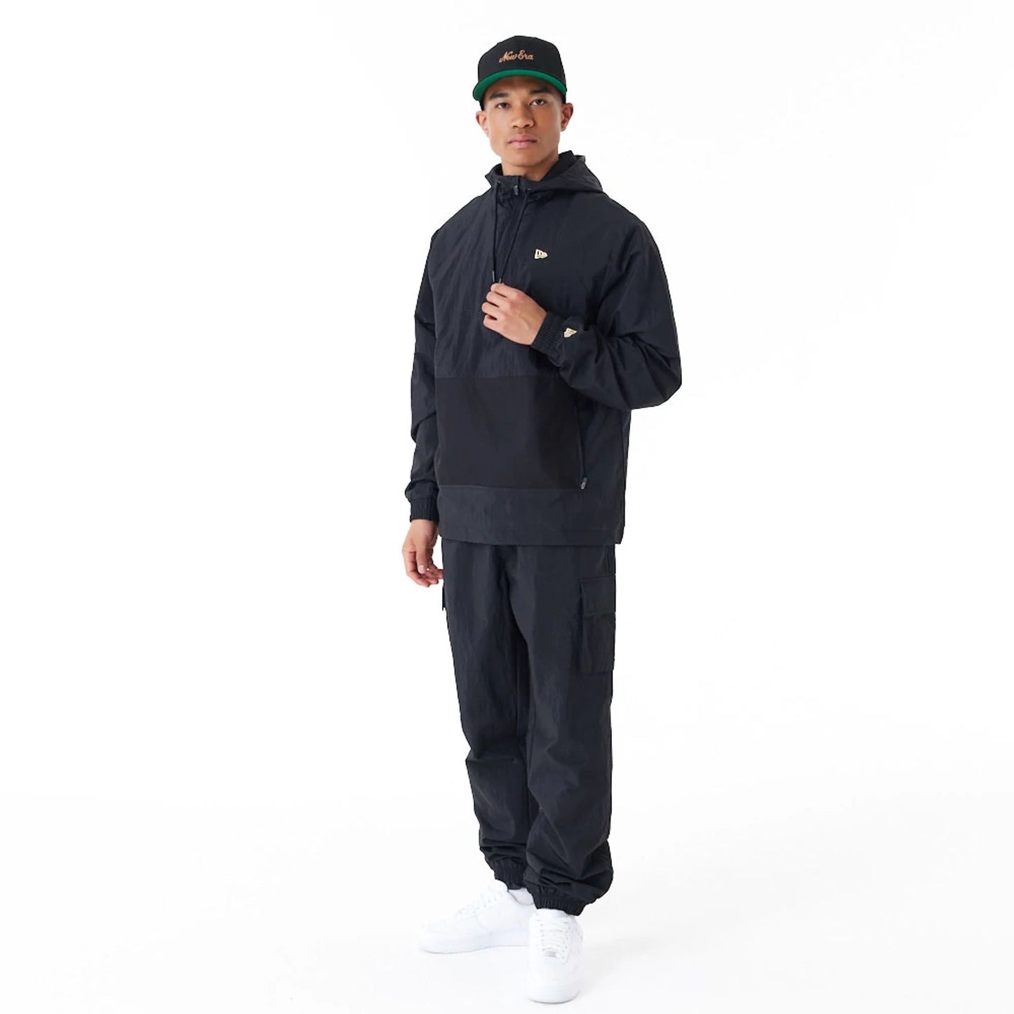 The Male model is wearing New Era Windbreaker Black Windbreaker 2