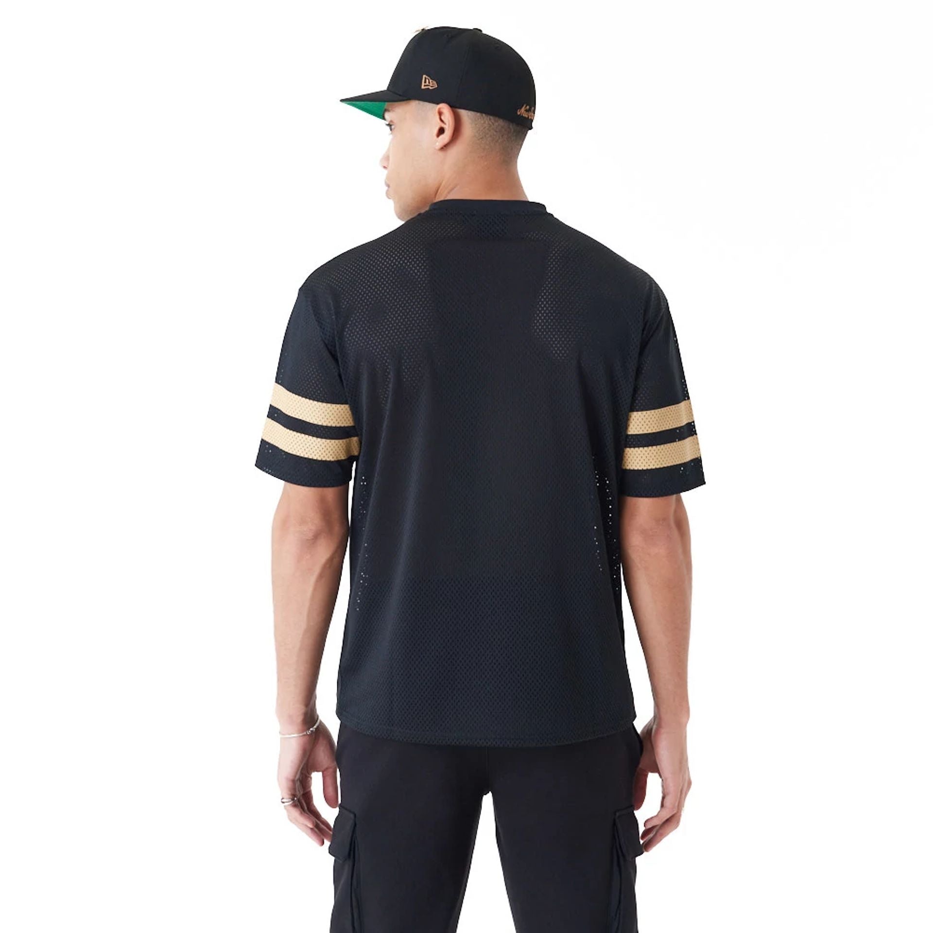 The Male model is wearing New Era Mesh Black Oversized T-Shirt 5