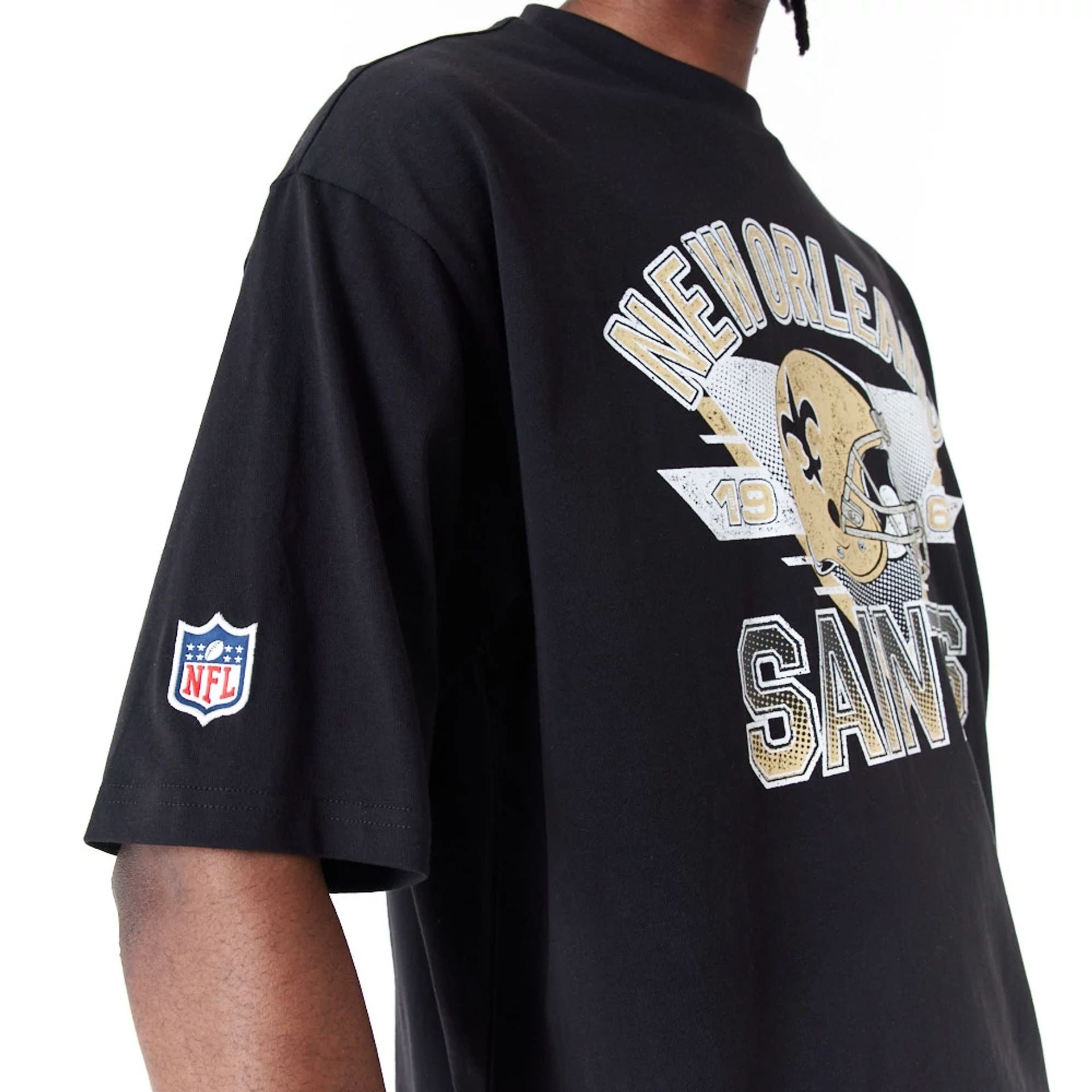 The Male model is wearing New Orleans Saints NFL Black Oversized T-Shirt 6