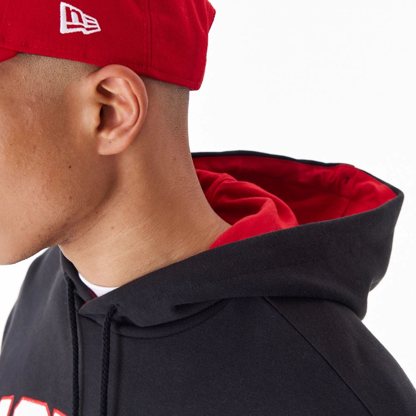 The Male model is wearing San Francisco 49Ers NFL Black Oversized Pullover Hoodie 3