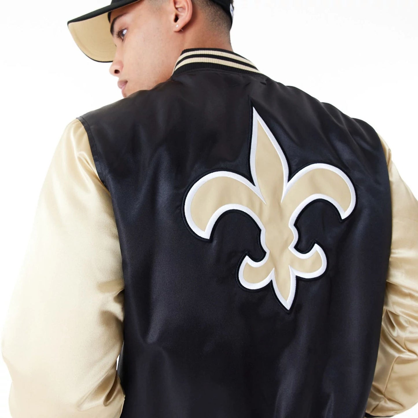 The Male model is wearing New Orleans Saints NFL Satin Black Bomber Jacket 3