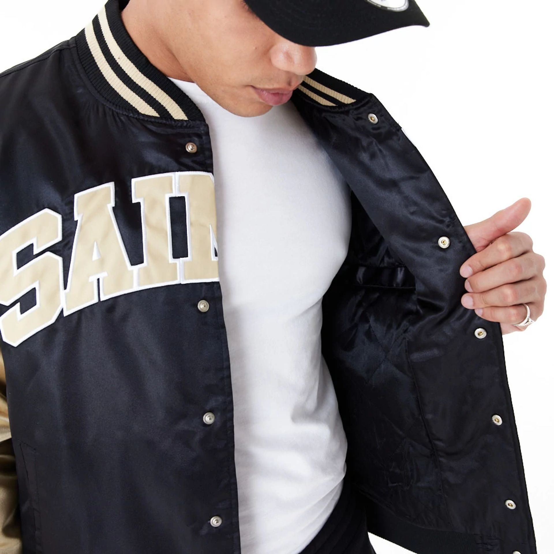 The Male model is wearing New Orleans Saints NFL Satin Black Bomber Jacket 4