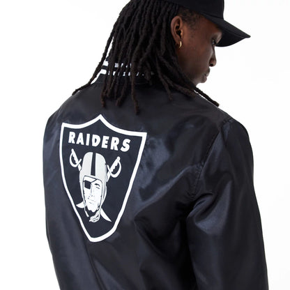 The Male model is wearing Las Vegas Raiders NFL Shiny Satin Black Bomber Jacket 6