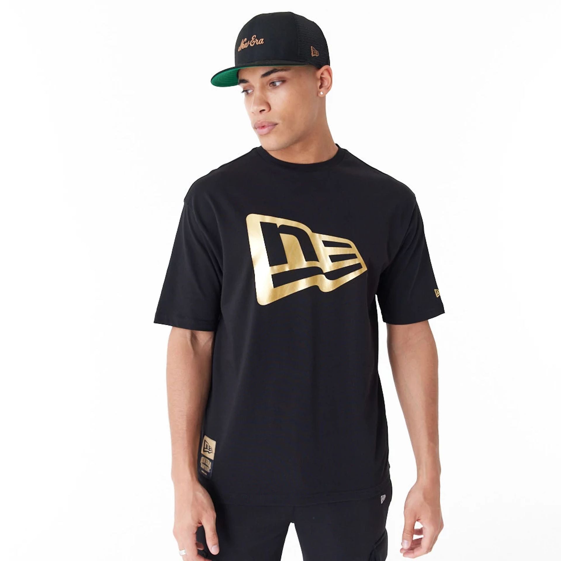 The Male model is wearing New Era Flag Black Oversized T-Shirt 1